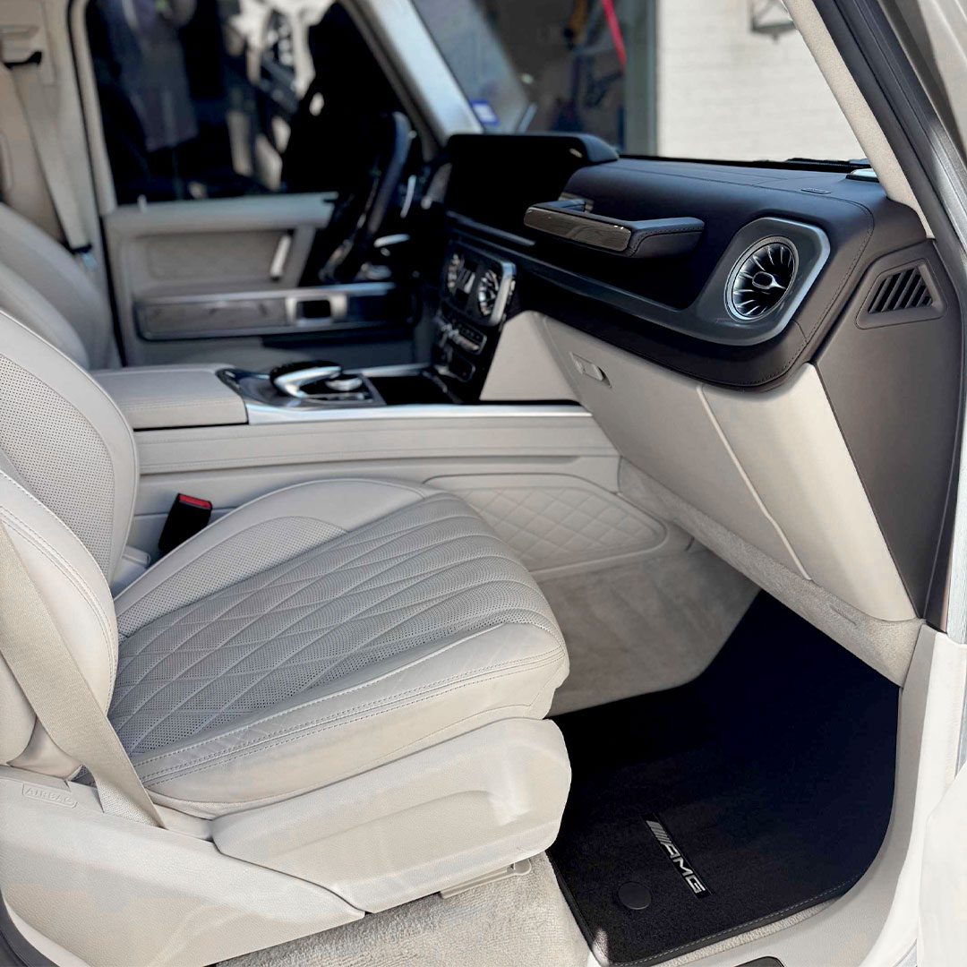 tan leather inside of vehicle front seat