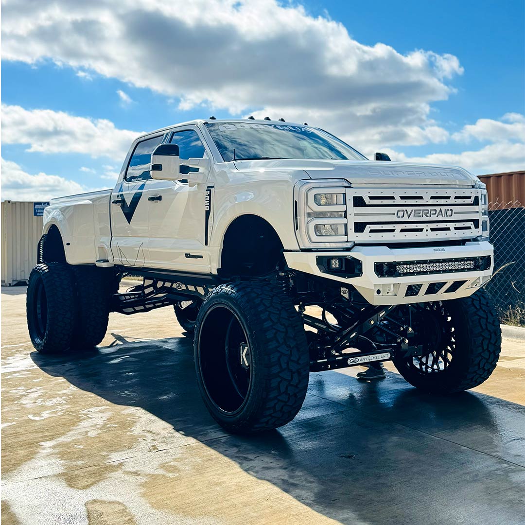 lifted white truck after being washed and dried shiny