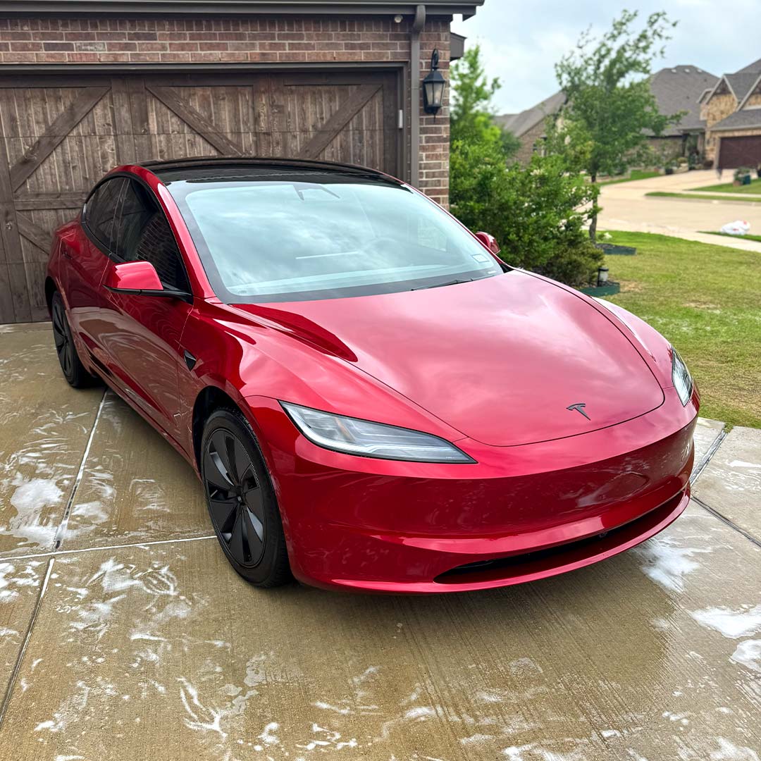 Red Tesla Model 3 after paint correction and ceramic coating in Dallas-Fort Worth, TX
